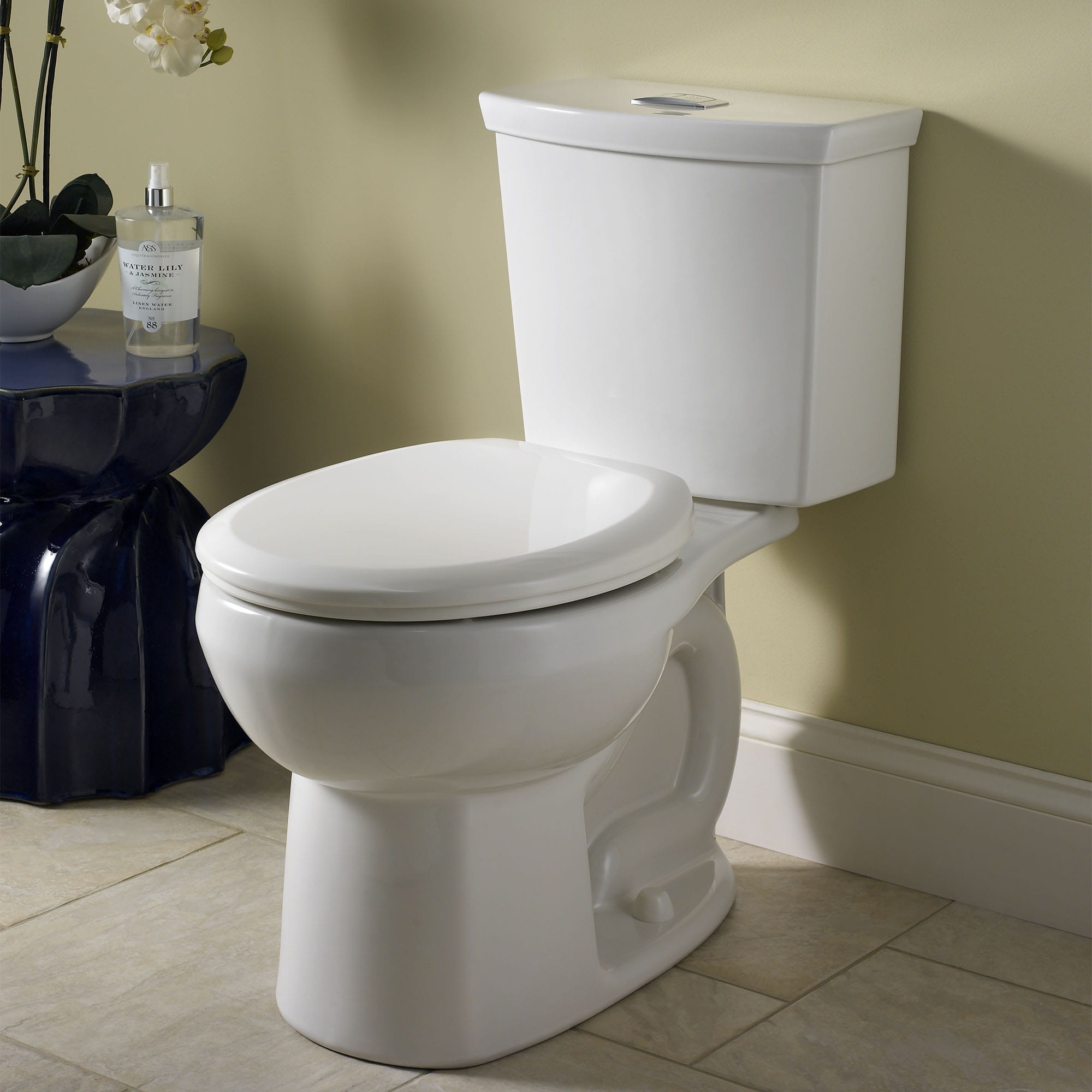 H2Option Two Piece Dual Flush 128 gpf 48 Lpf and 092 gpf 35 Lpf Standard Height Round Front Toilet Less Seat WHITE